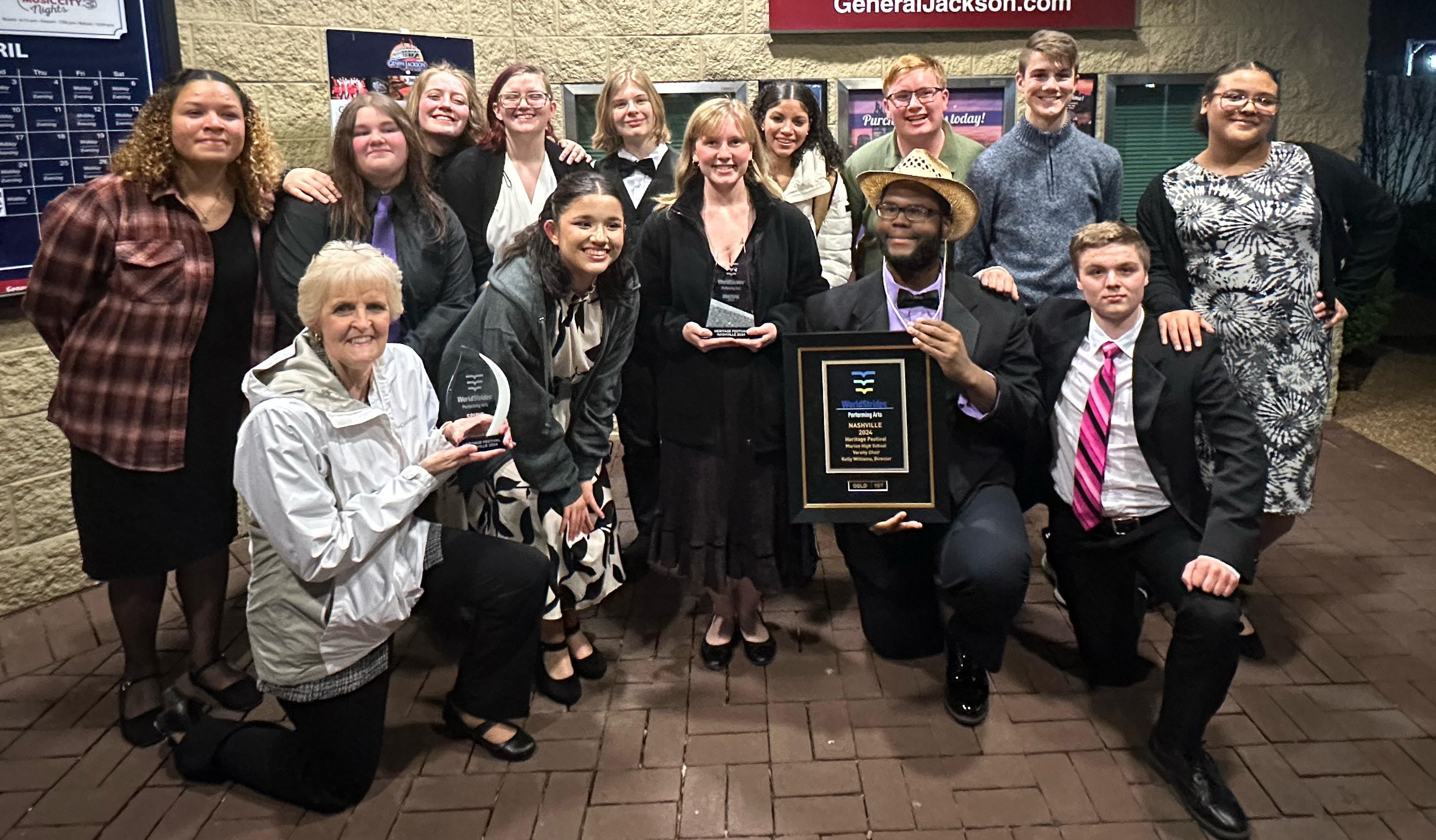 Members of the Marion High School Varsity Choir pose for a photo with their awards from the Worldstrides Heritage Music Competition in Nashville, held April 3-6, 2024. (Photo provided by Marion Community Schools)